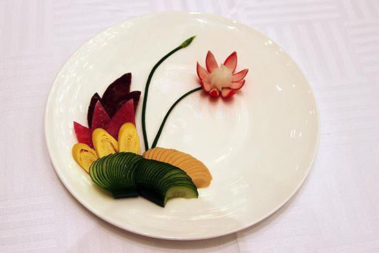 迎賓冷盤“洋花蘿卜”。 花惠生 供圖