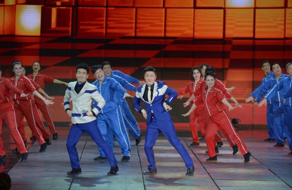 《小蘋果》、《最炫民族風(fēng)》等廣場舞曲將會有全國統(tǒng)一、編排科學(xué)、帶給人正能量的全新動作。 CFP 資料