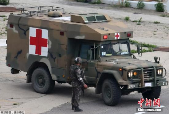 資料圖：當(dāng)?shù)貢r間2014年6月23日，韓國江原道哨所槍擊事件肇事士兵林某已被抓獲